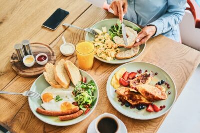 couple eating delicious breakfast