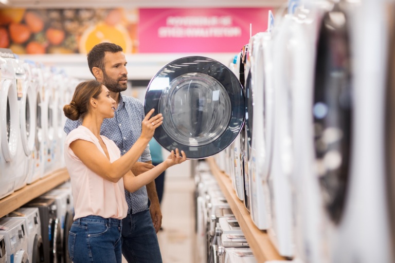 couple looking for a proper drying machine