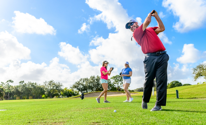 Adult playing Golf